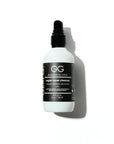 A bottle of VEGAN SUPER CLEANSER by Geri G with a white label and black text, indicating it is a facial cleanser for removing makeup and exfoliating the skin.