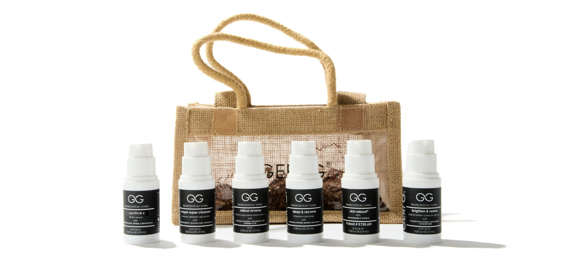 Set of six black bottles with white caps labeled  on a white background, with a woven bag in the background by geri g.